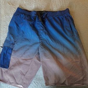 Ombré swim trunks.